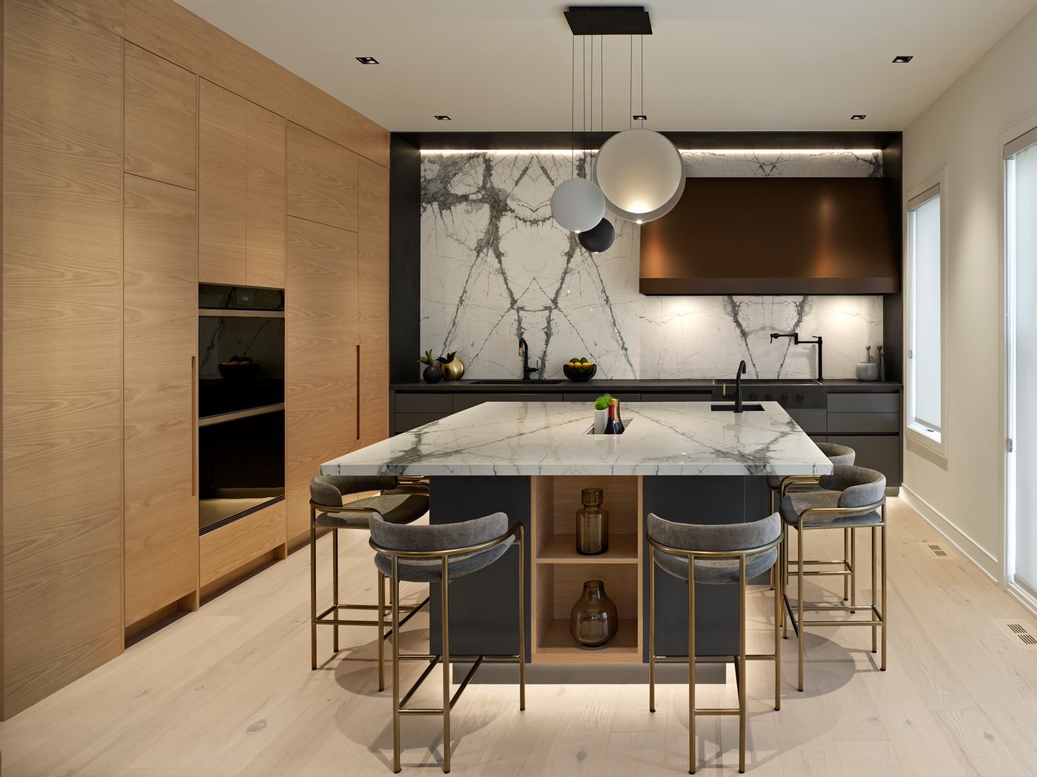 Limerick Point model home kitchen with marble island and custom millwork